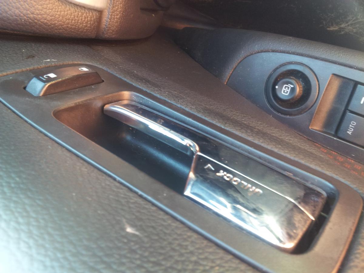 Ouch! Peeling Fusion doorhandle cuts me deep. - Ford Motor Company