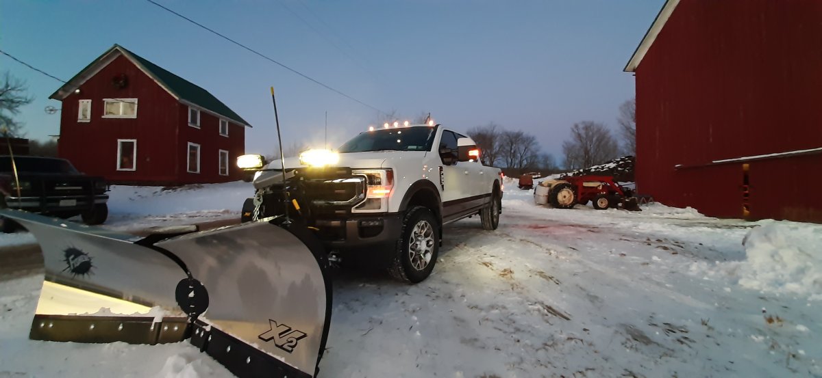 Snow Plow Prep Package vs. Heavy Service Front Suspension Package F